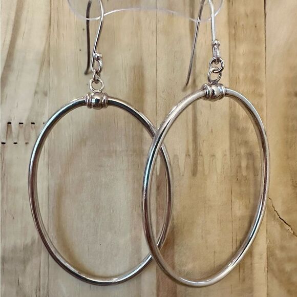 Elegant Silver Hoop Earrings - Picture 2 of 4